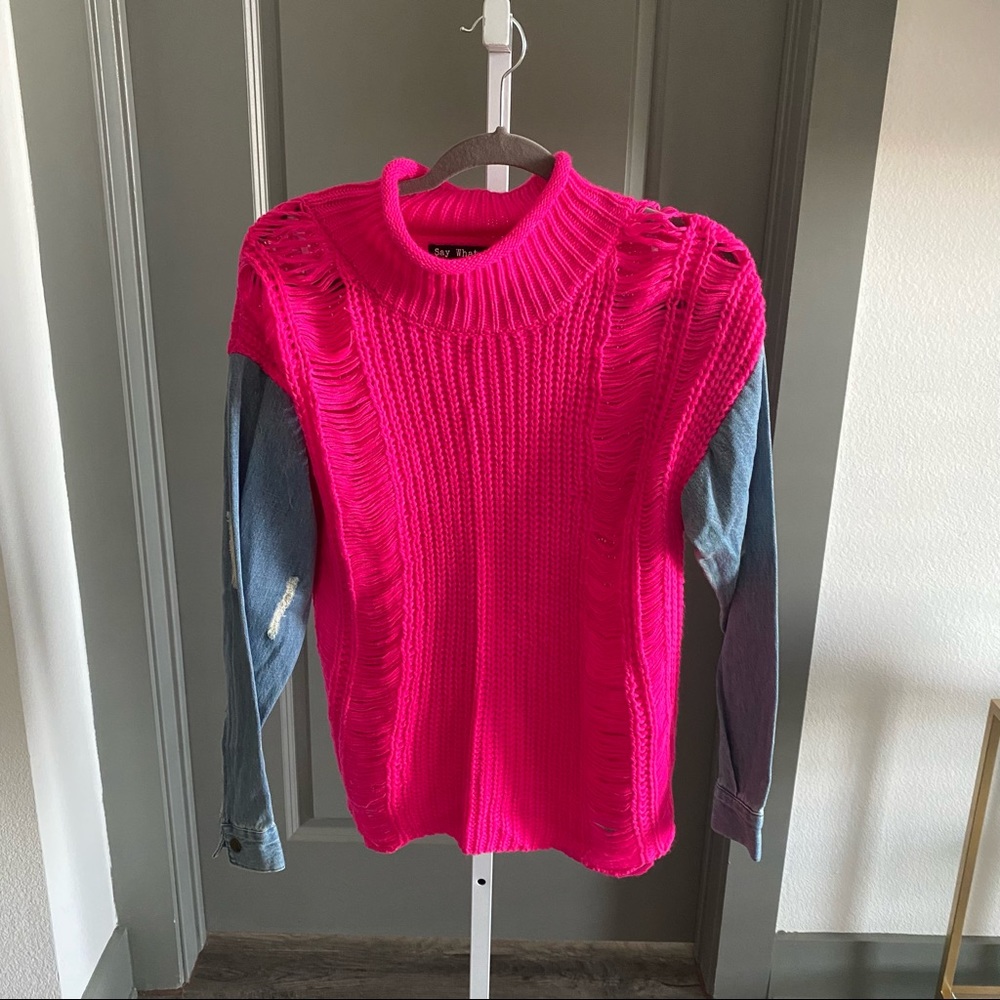 Hot pink sweater with denim sleeves